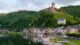 Master 50 Essential German Phrases Before Your Trip to Germany 4 castle on hill over village near body of water