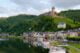 Master 50 Essential German Phrases Before Your Trip to Germany 1 castle on hill over village near body of water