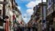 Master Top 50 Portuguese Phrases Before Your Trip: A Travel Must 3 photo of people walking on street near buildings