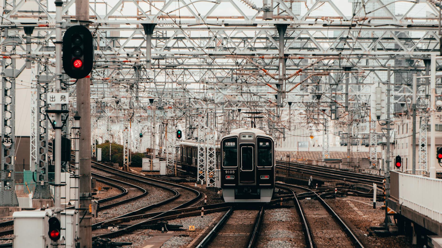black and gray train on rail tracks